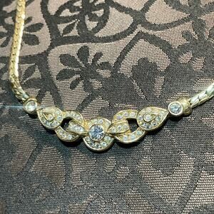 Christian Dior Pave Studded Gold tone Necklace with adjustable chain.